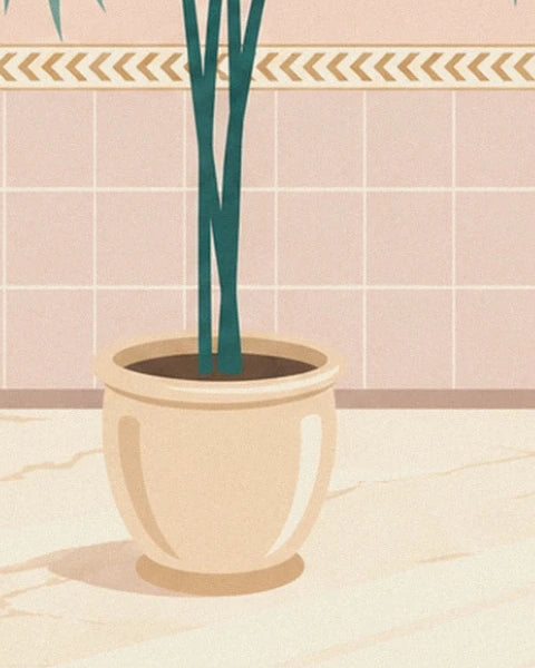 Le pot de terre beige et les tiges du palmier, sur le carrelage rose et le sol de marbre