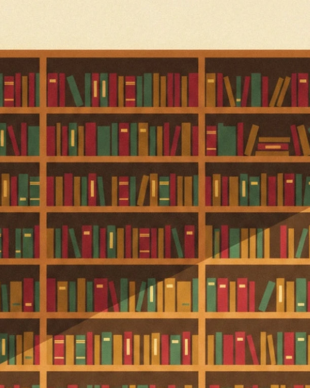 The wall of red, green and ochre books arranged on wooden shelves