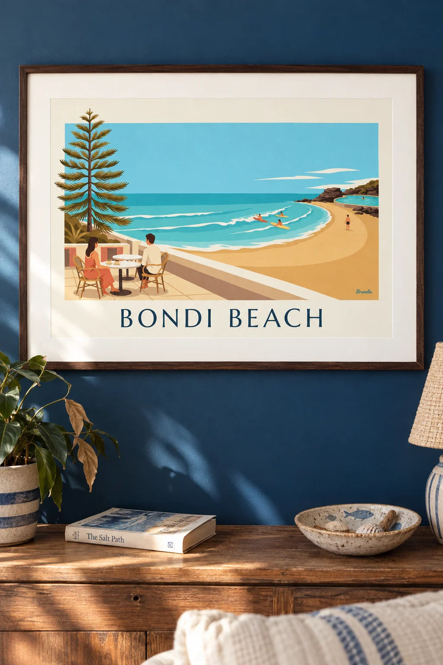 Poster of a café terrace facing Bondi Beach in Sydney: framed on the wall