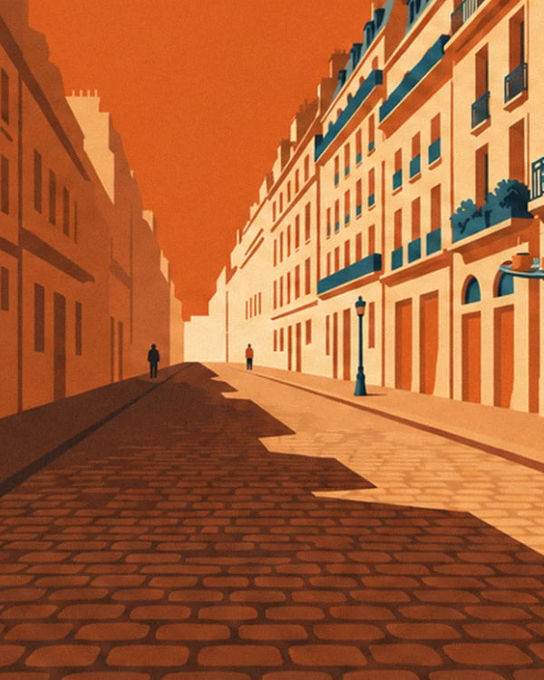 A cobbled Paris street in shadow, with a blue street lamp and cream façades with balconies