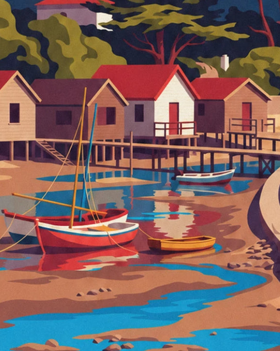 Les cabanes sur pilotis aux toits rouges et les barques échouées à marée basse