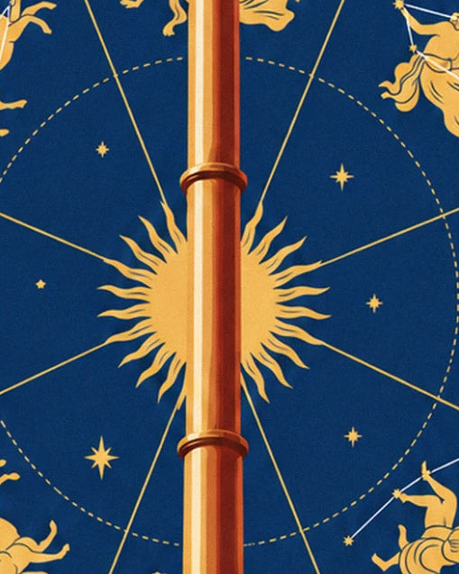 The golden sun against a midnight blue background, crossed by the brass tube of the telescope