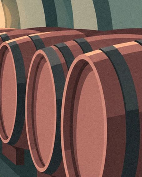 Les fûts de chêne aux teintes rosées et aux larges cerclages sombres dans le chai