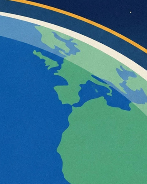 Europe and Africa in green beneath the pale curve of Earth's horizon