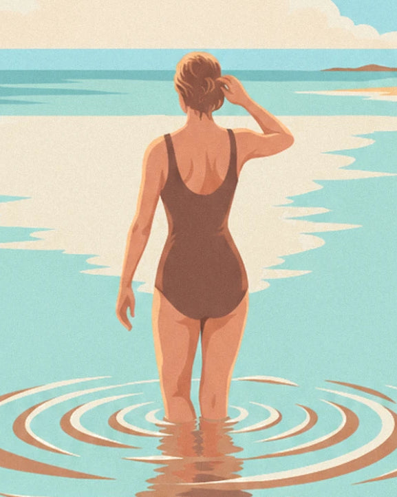 The bather seen from behind in a brown swimsuit, with one hand in her hair, surrounded by ripples in the clear water