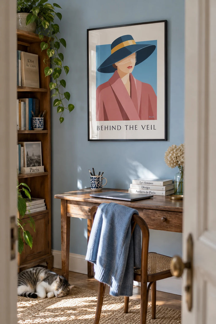 Poster of an elegant woman in a hat with a veil: framed on the wall