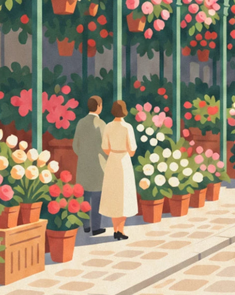 Un couple de dos devant les pots de roses blanches et rouges