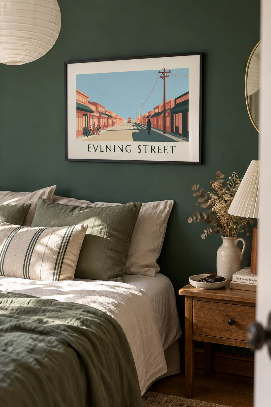 Poster of a Japanese shopping street at sunset: framed on the wall