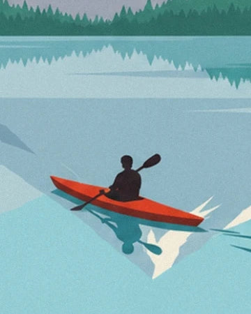 A kayaker in silhouette in a red kayak on the lake with turquoise reflections