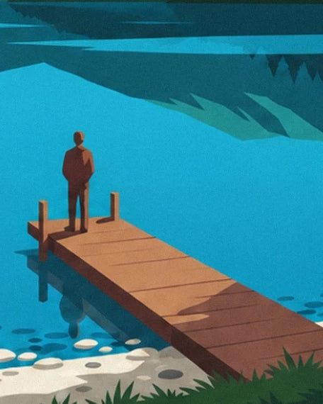 A figure on the wooden jetty above turquoise water edged with pebbles