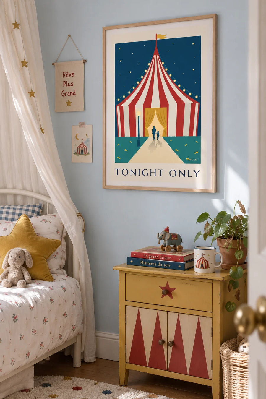 Poster of a circus tent entrance lit with string lights: framed on the wall
