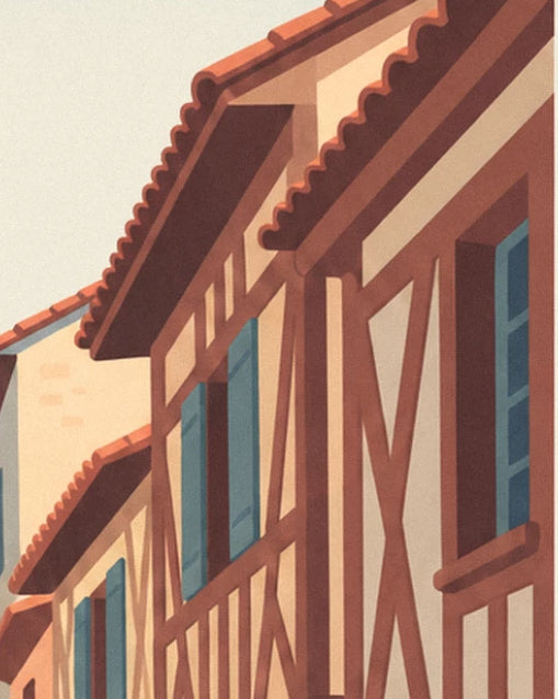 The red timber-framed façades and their blue shutters beneath tiled roofs