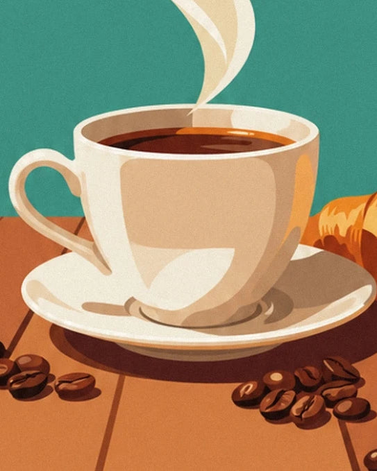 A cup of steaming coffee on a cream saucer, surrounded by beans on the wooden table