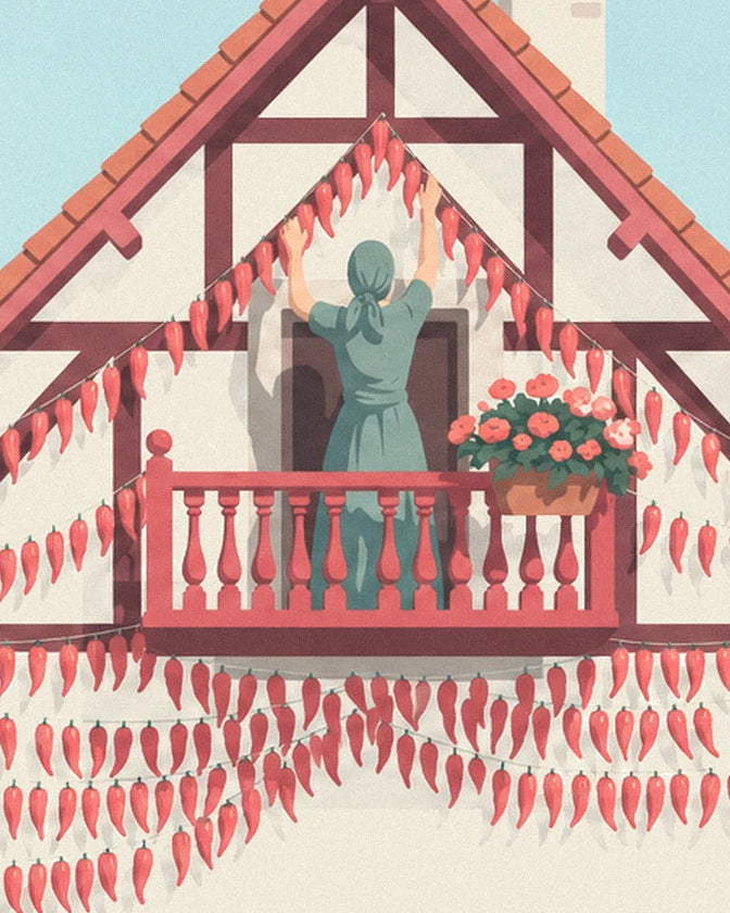 A woman in a green dress hanging strings of chillies on the flower-filled balcony
