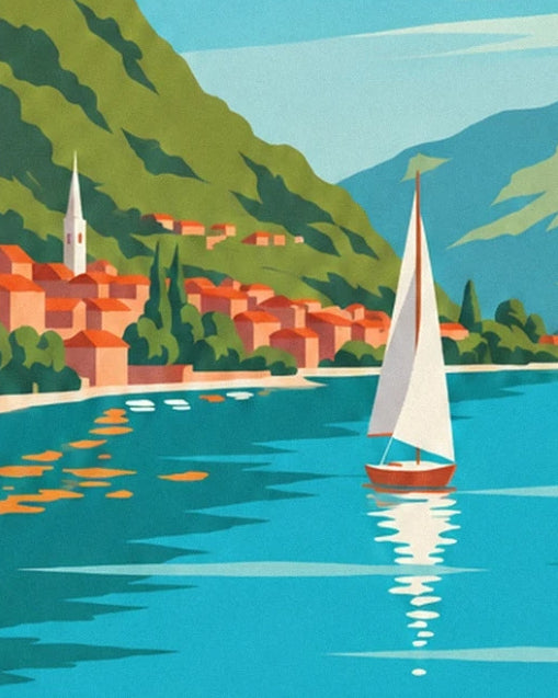 A sailing boat in front of a village with orange roofs and a bell tower at the foot of the mountains