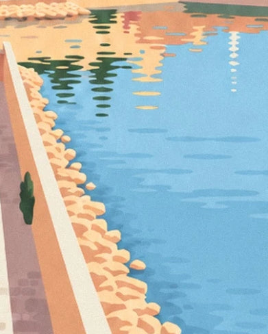 The colourful reflections on the blue harbour water, along the rock-lined quay