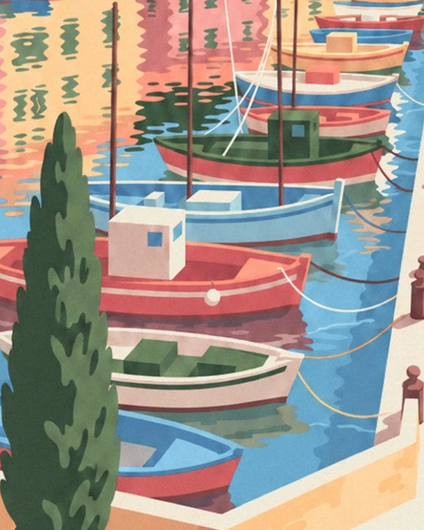 The red, blue and green boats moored at the quay, behind a tall cypress