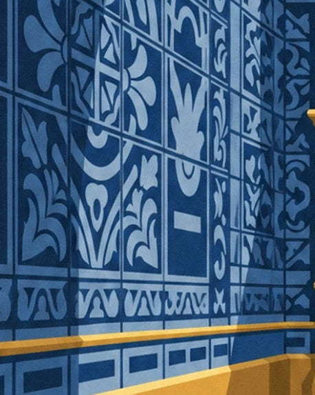The blue tiles with floral and geometric patterns above a golden moulding