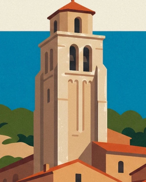 The Romanesque bell tower with arched openings above the village’s orange rooftops