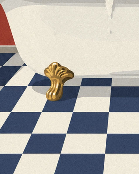 De gouden messing poot van het bad op de marineblauw-witte geblokte vloer