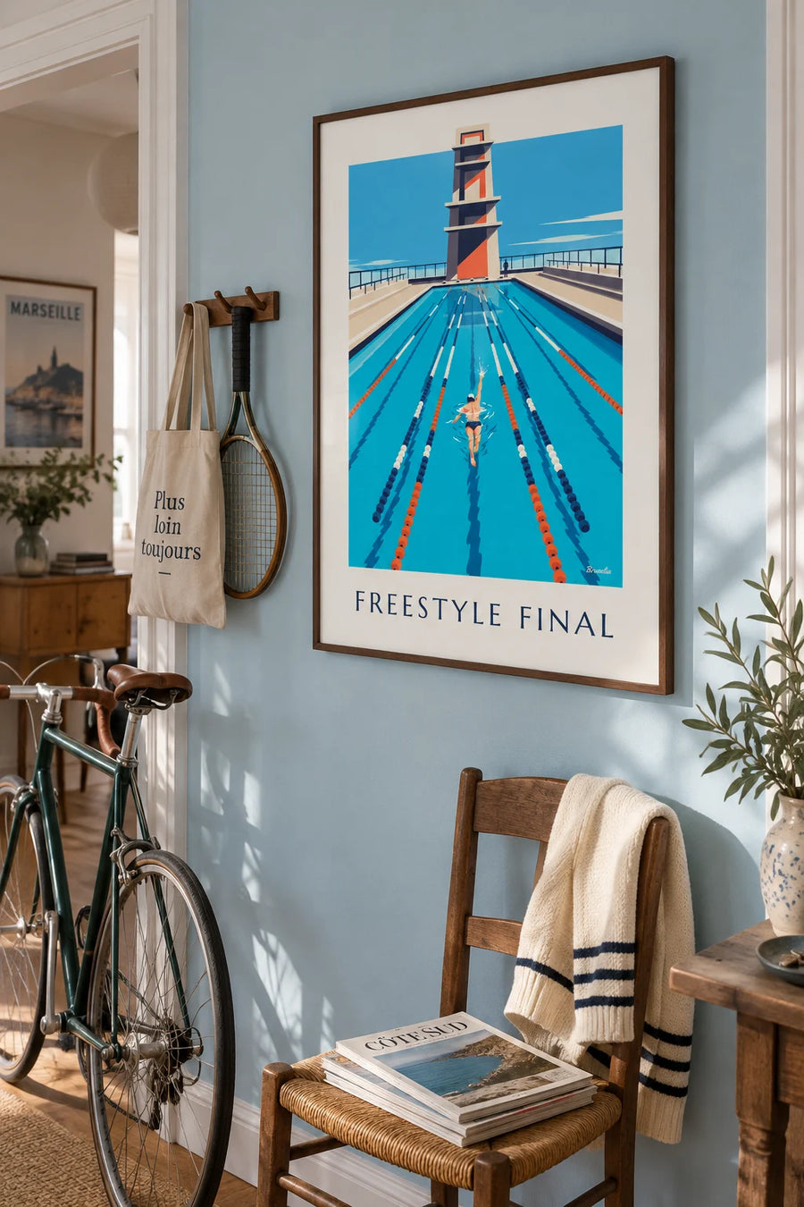 Poster of a freestyle swimmer at the championships: framed on the wall