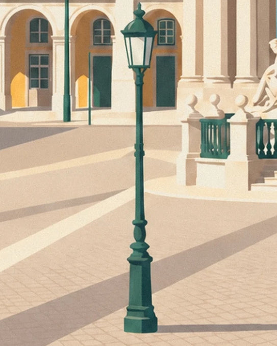 A green street lamp and long shadows on the cobbles of place du Commerce