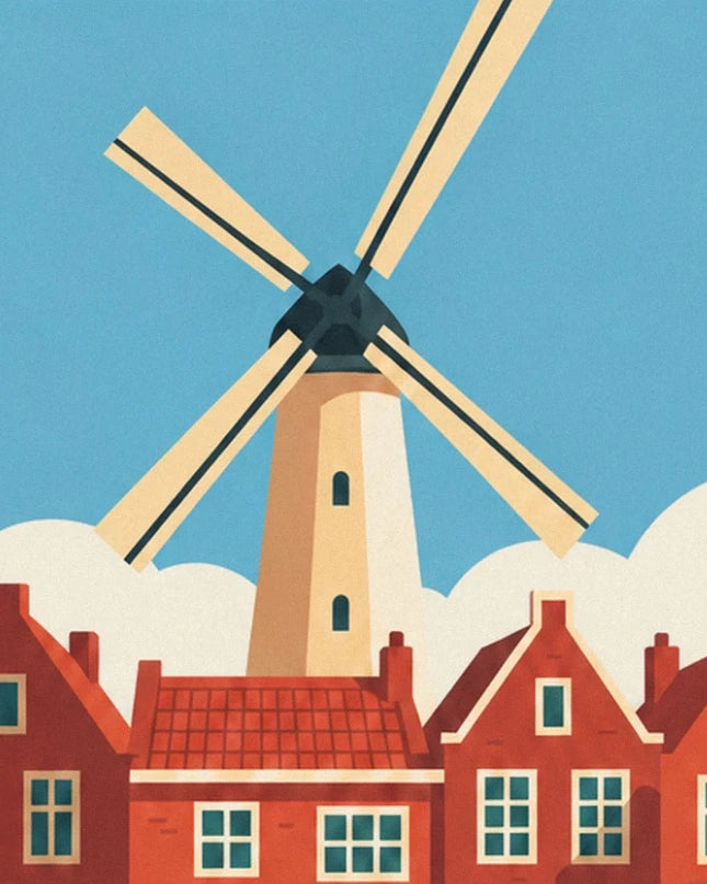 The windmill with cream sails above the Dutch houses with red roofs