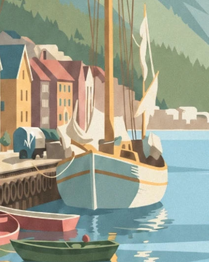 A sailing boat with a pale blue and white hull moored in front of the houses of Bergen