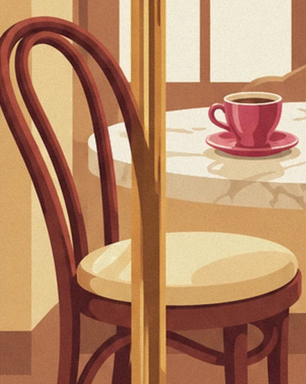 A bentwood chair and a pink cup on the tea room table