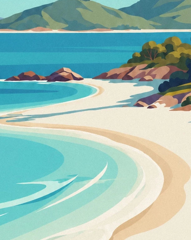 The white sandy beach between turquoise waters, rocks and lush green hills