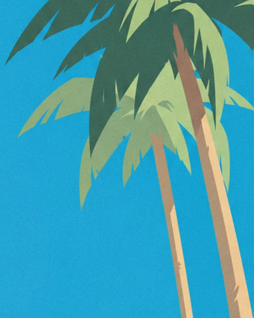 The long golden palm trunks and their large green fronds against a blue background