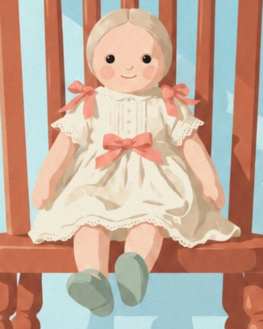 The doll in a cream dress with pink bows and green shoes on her wooden chair