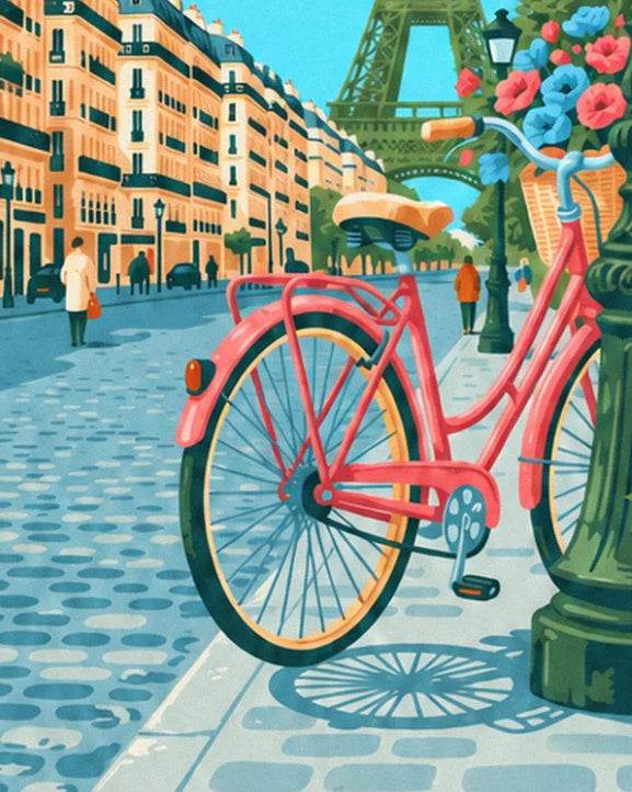 The coral bicycle with a basket of blue and pink flowers, parked on the cobbled pavement