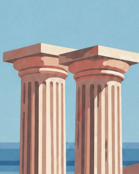 Les 2 colonnes antiques aux chapiteaux rosés devant la mer bleue d’Alexandrie