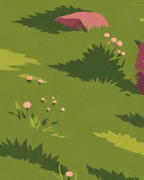 Des fleurs roses parmi les touffes d’herbe verte et les rochers rosés