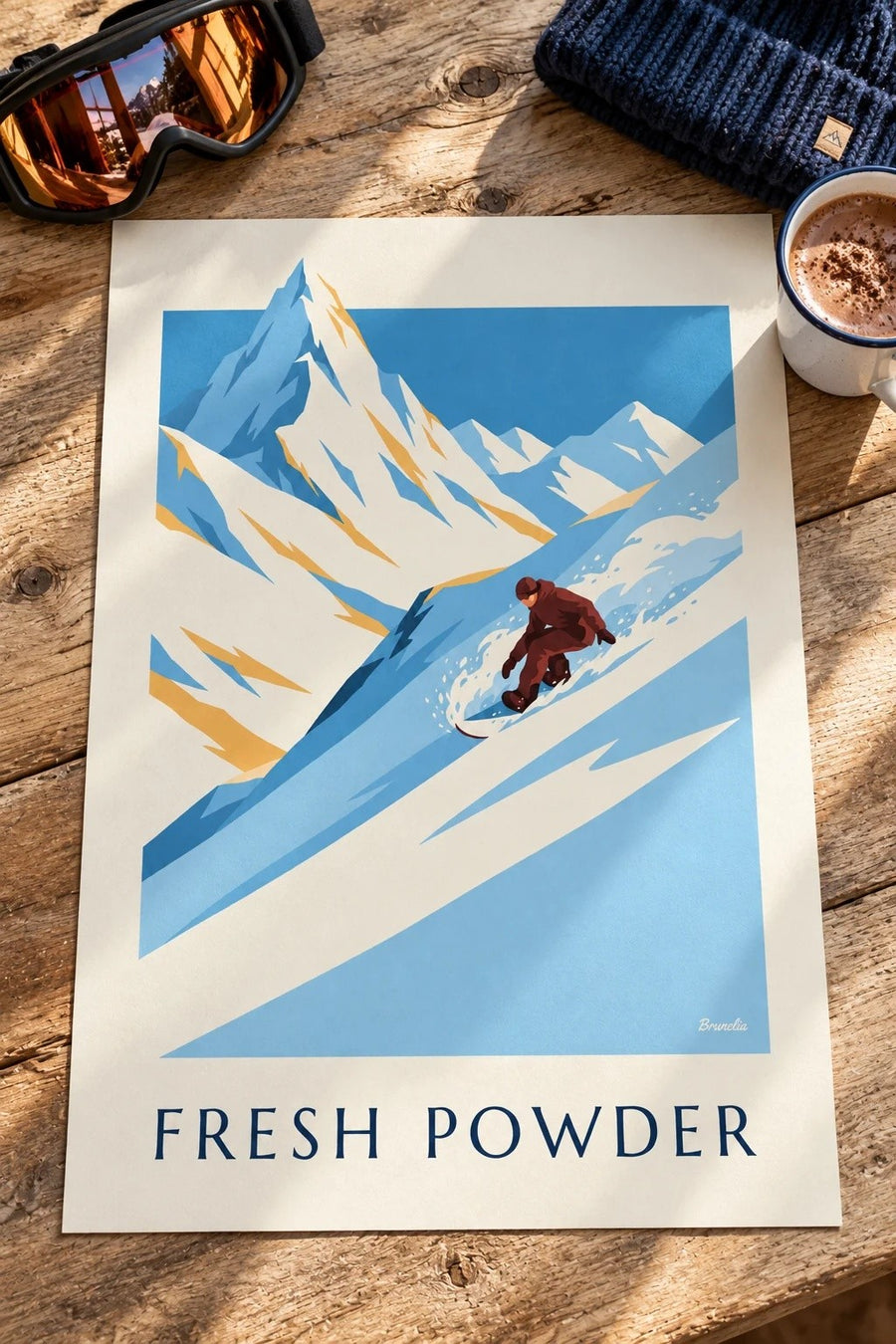 Affiche snowboard dans la poudreuse : posée sur une table