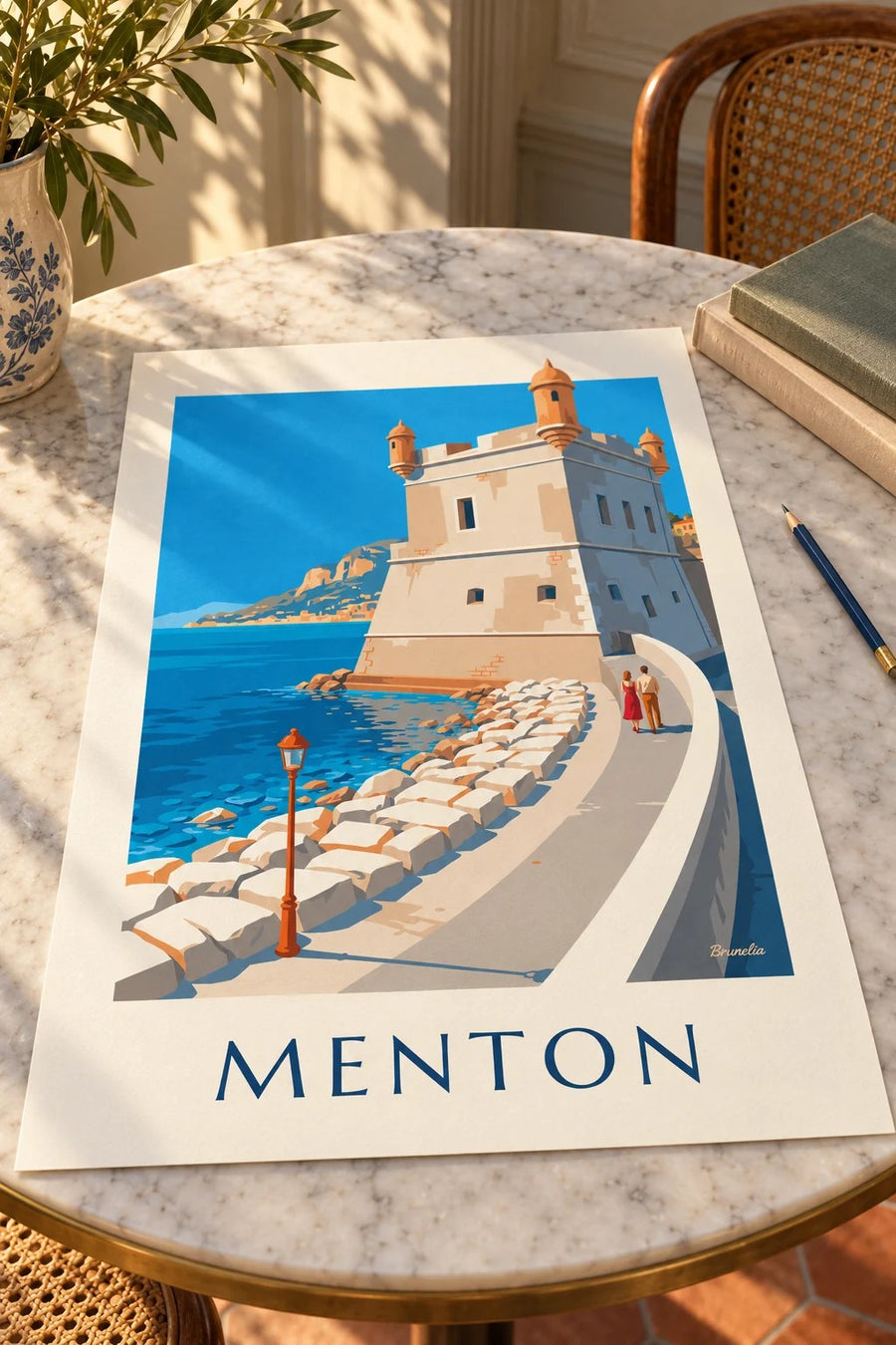 Poster van het Bastion in de oude haven van Menton aan zee : neergezet op een tafel