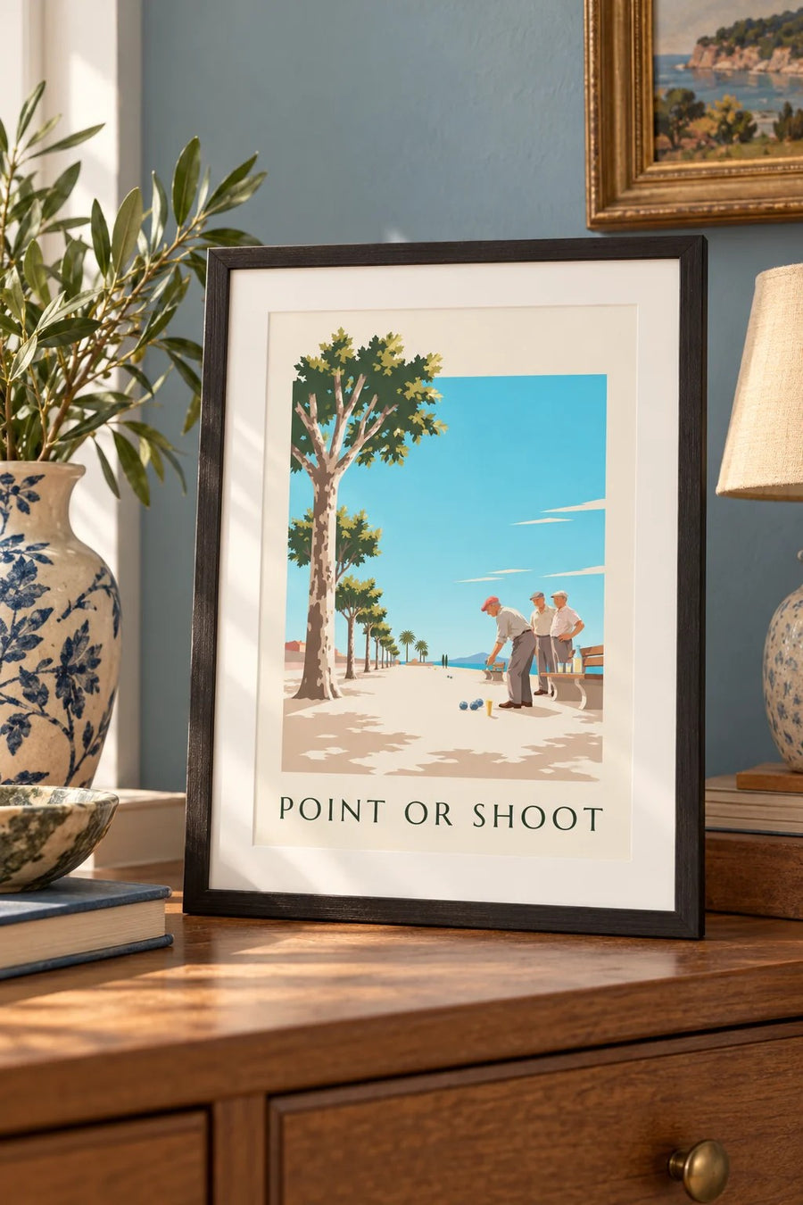 Affiche van een potje pétanque onder de platanen : klein A4-formaat, ingelijst
