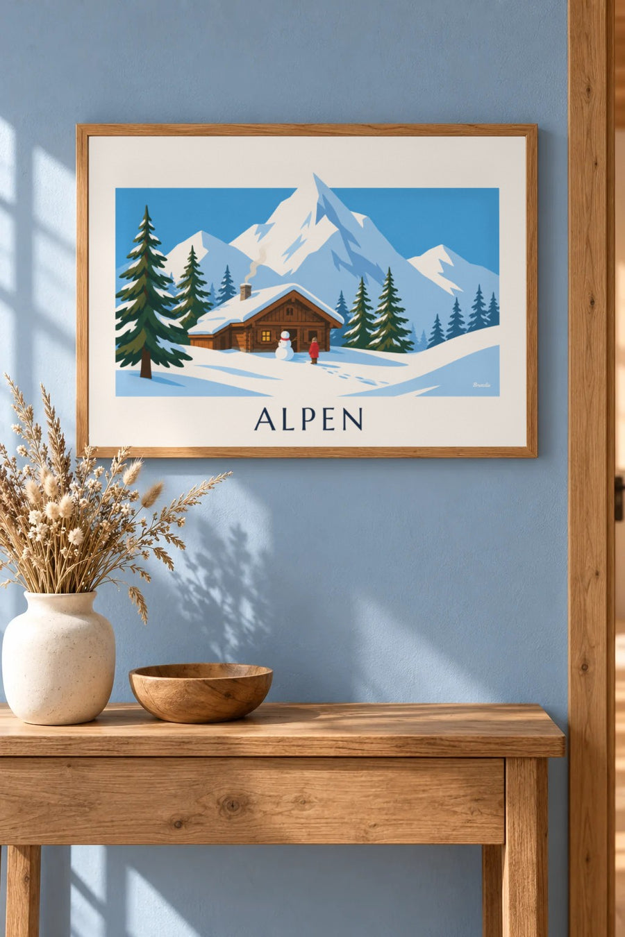 Poster besneeuwd chalet en sneeuwpop in de Alpen: klein A4-formaat, ingelijst