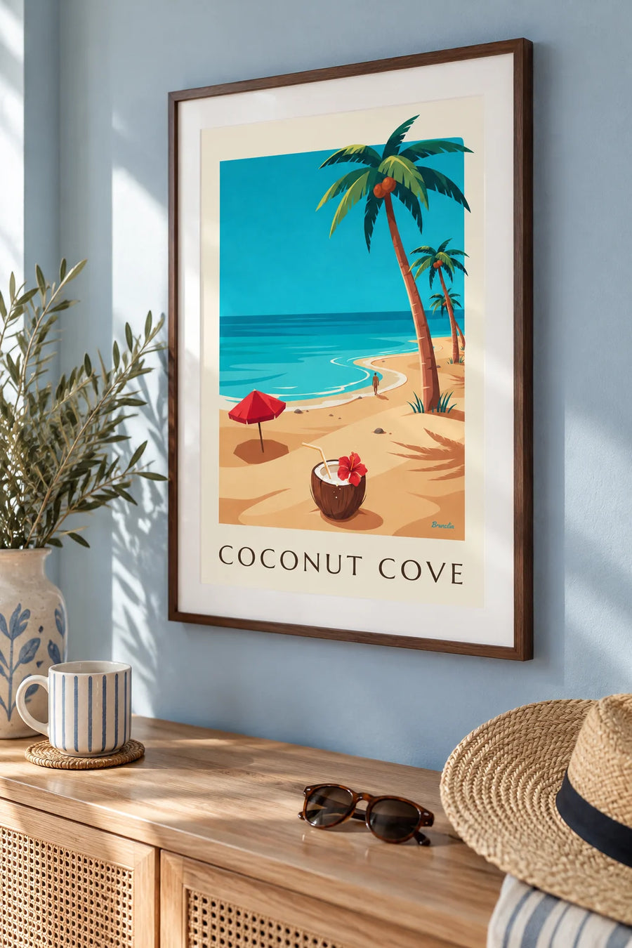 Poster of a cocktail served in a coconut on a tropical beach: framed on the wall