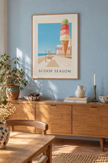 Poster of a 3-scoop ice cream cone by the sea: framed on the wall