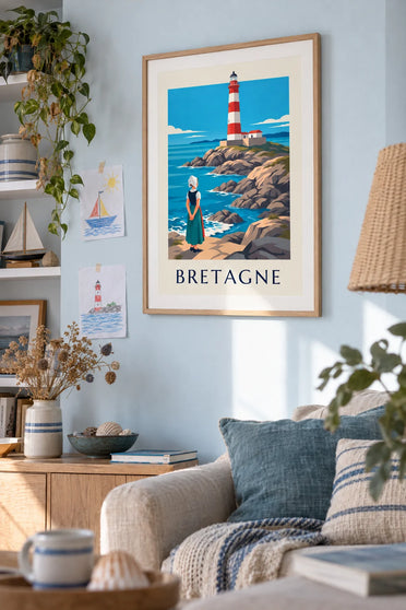 Poster of a woman in a Breton headdress in front of a red and white lighthouse: framed on the wall