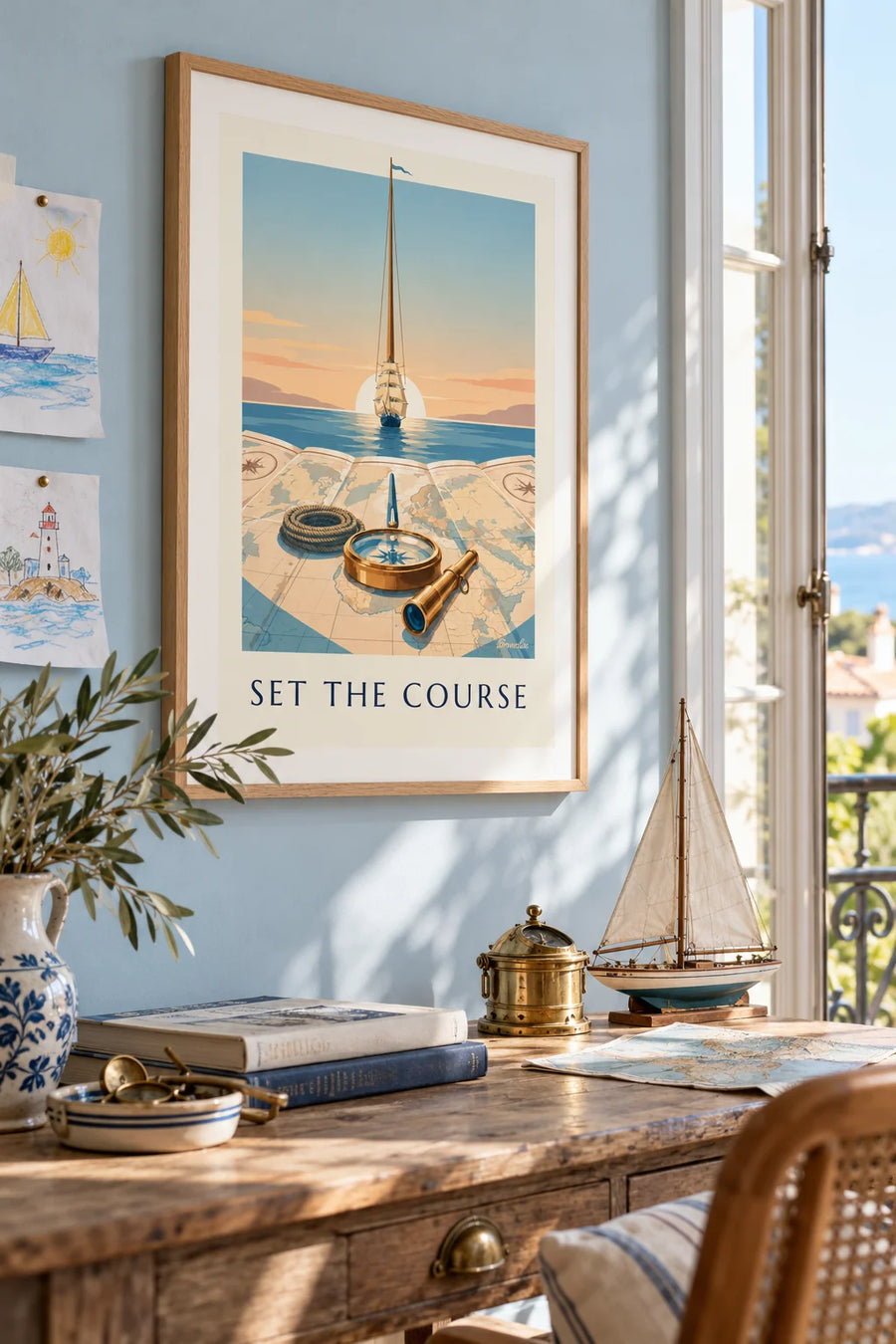 Brass nautical compass on a sea chart poster: framed on the wall