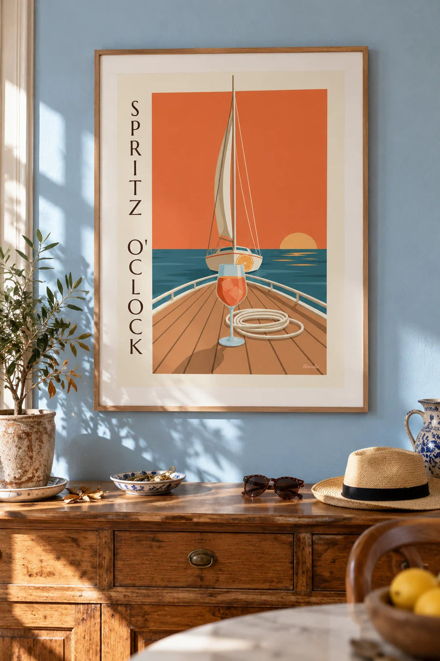 Affiche spritz sur le pont d'un voilier au coucher du soleil : encadrée au mur