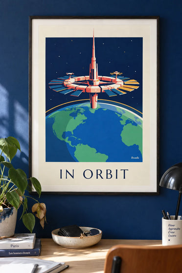 Poster of a space station orbiting the Earth: framed on the wall