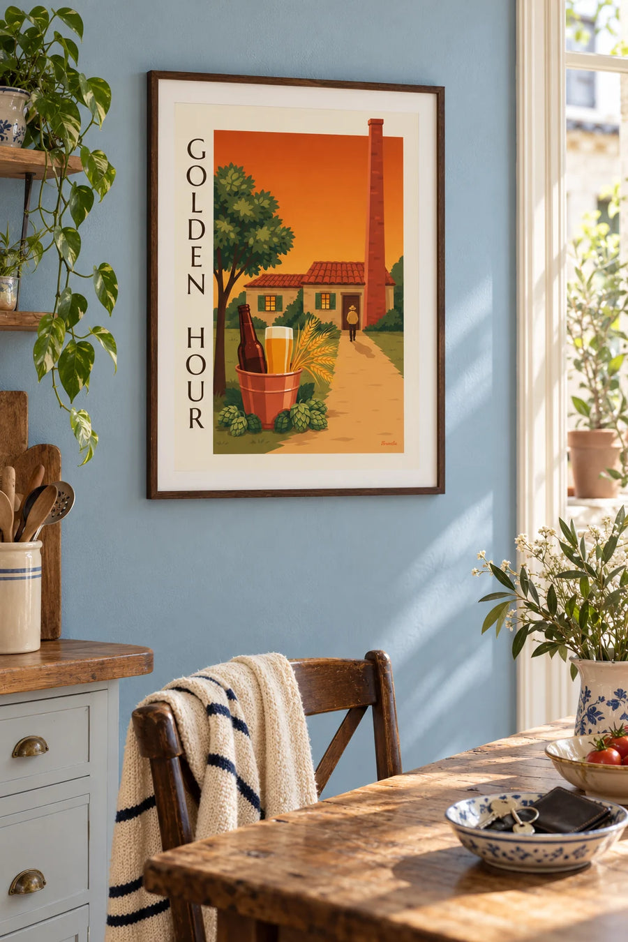 Poster of a cold beer, hops and wheat in front of a farm brewery: framed on the wall