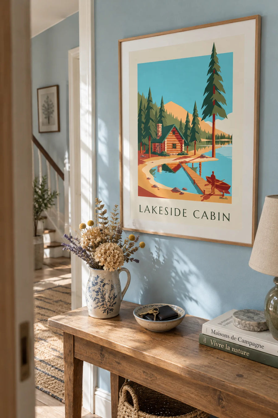 Affiche cabane en rondins au bord d’un lac de montagne : encadrée au mur