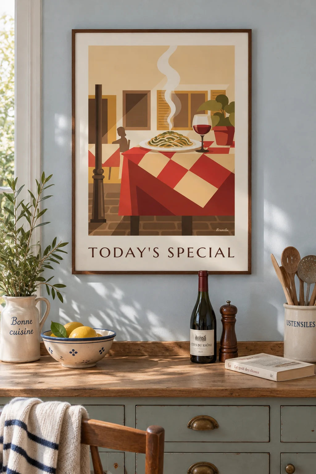 Terrace table with spaghetti and red wine glass poster on the wall