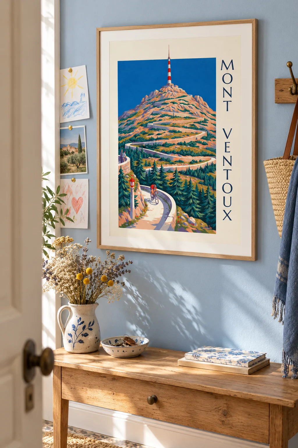 Cyclist on Mont Ventoux hairpins and antenna poster on the wall