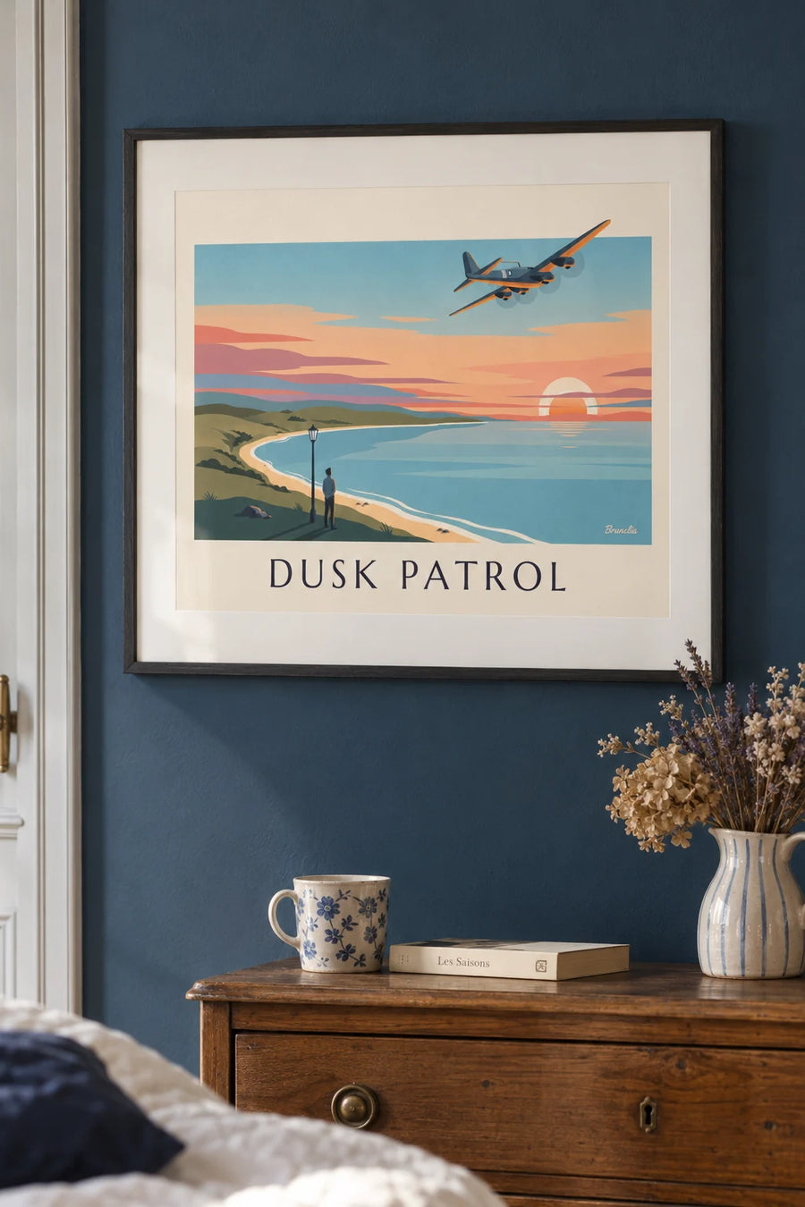 Poster of a four-engine bomber plane at sunset: framed on the wall